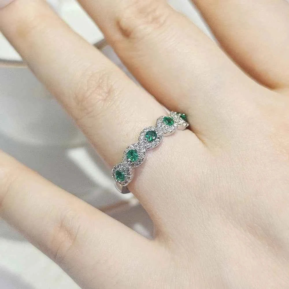 Green zircon eternity Rings