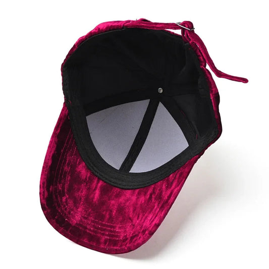 Stylish velvet hat in burgundy color with a soft inner lining and an adjustable strap