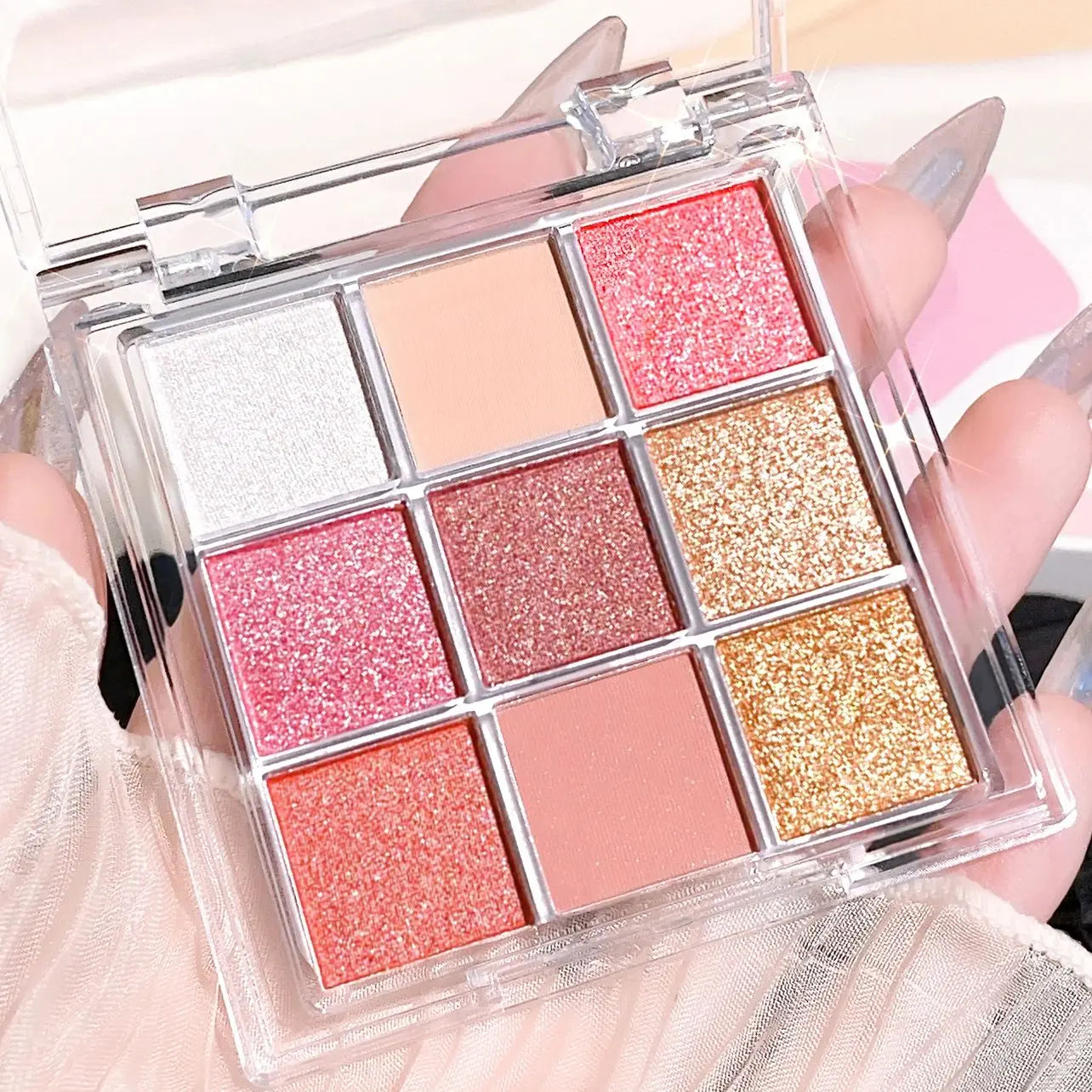 Summer 9 color eyeshadow palette: Orange brown, pink and gold, matte shimmer effect